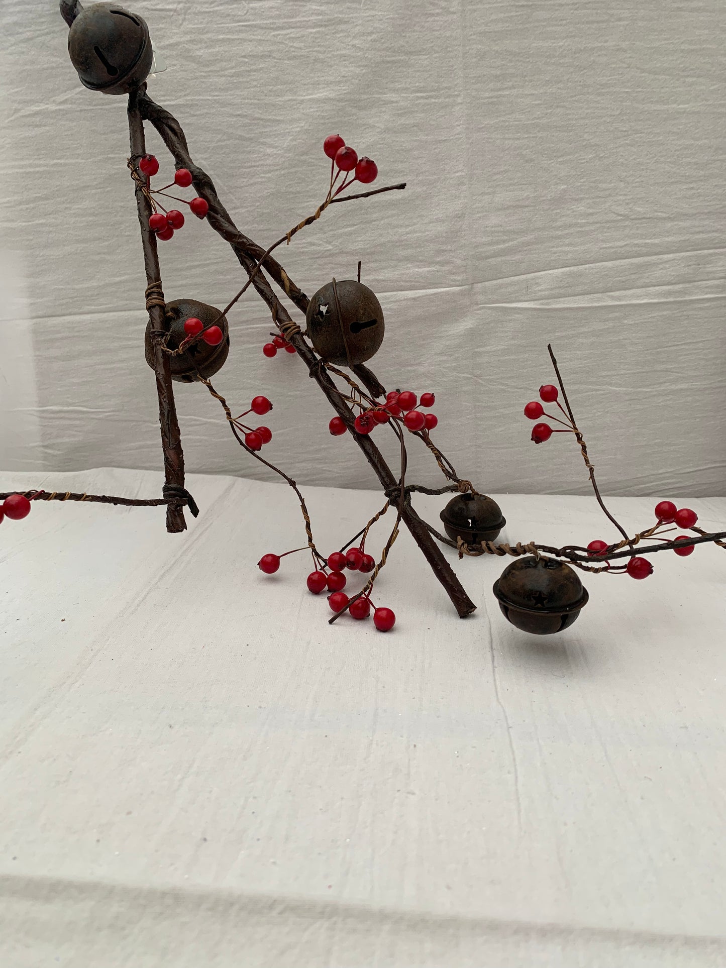 Rust Bell and Red Berry Branch