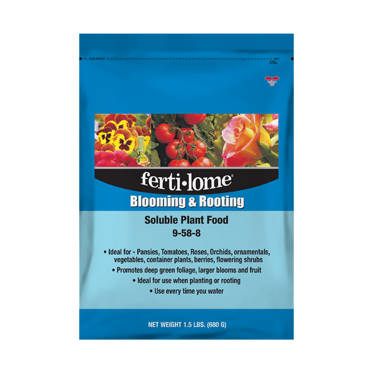 Fertilome Blooming & Rooting Soluble Plant Food packaging with images of flowers and tomatoes on a blue background.