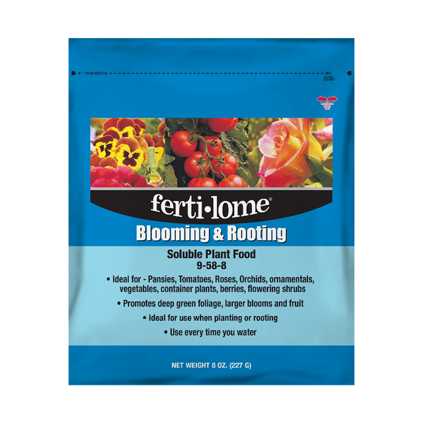 Fertilome Blooming & Rooting plant food package with images of flowers and vegetables on a blue background.