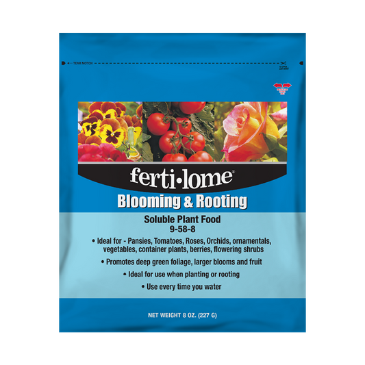 Fertilome Blooming & Rooting plant food package with images of flowers and vegetables on a blue background.